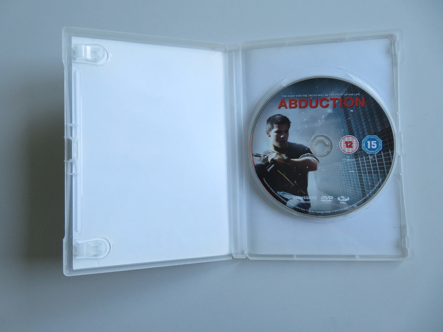ABDUCTION (DVD) TAYLOR LAUTNER SIGOURNEY WEAVER LILY COLLINS 2011 REGION 2 - Rendezvous Cinema