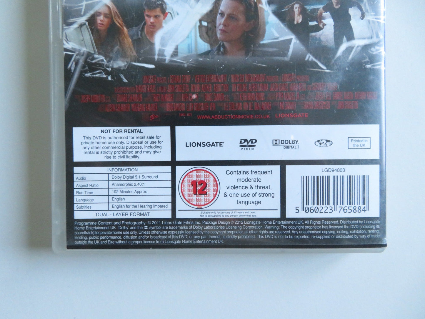 ABDUCTION (DVD) TAYLOR LAUTNER SIGOURNEY WEAVER LILY COLLINS 2011 REGION 2 - Rendezvous Cinema